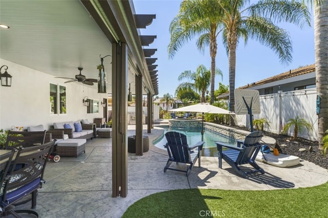 view of patio / terrace featuring ceiling fan, an outdoor living space, and a fenced in pool