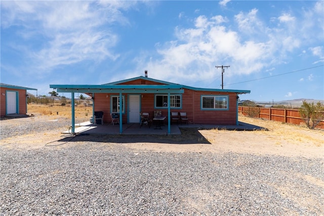 view of front of property featuring a patio area