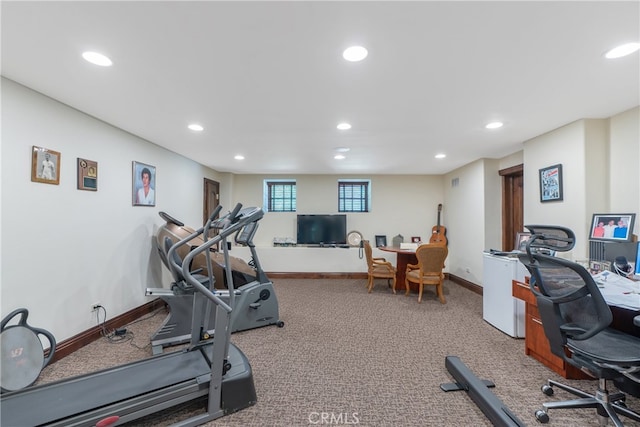 workout room with recessed lighting and baseboards