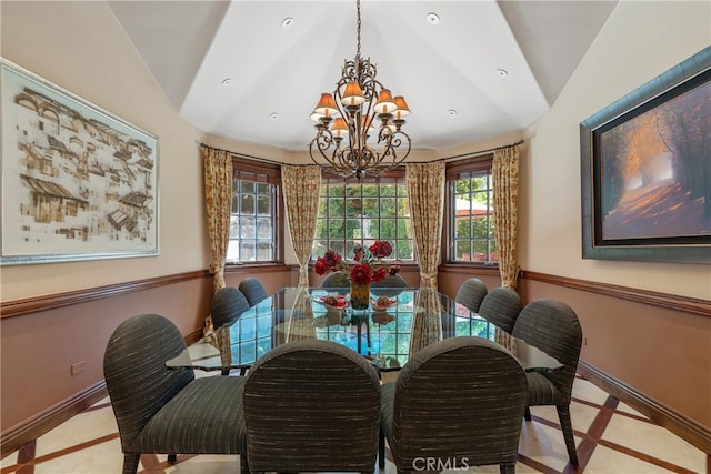 dining room with an inviting chandelier, recessed lighting, baseboards, and vaulted ceiling