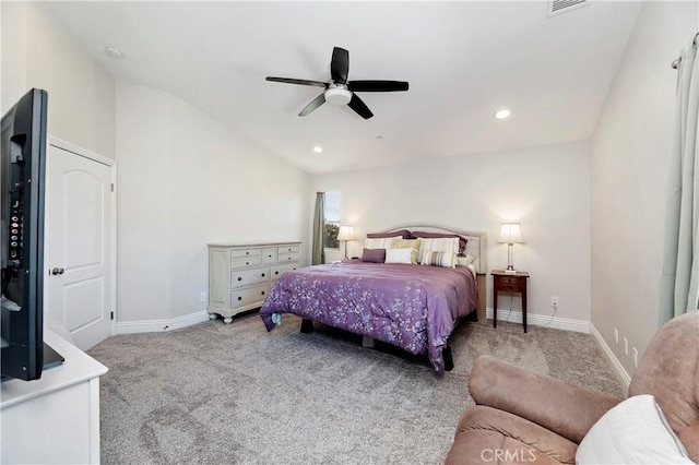 carpeted bedroom featuring ceiling fan and vaulted ceiling