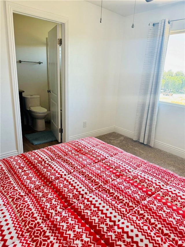 bedroom featuring connected bathroom