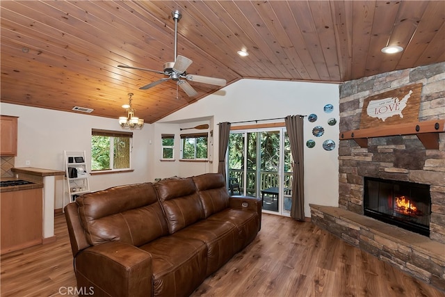 living room with wood ceiling, plenty of natural light, and light hardwood / wood-style floors