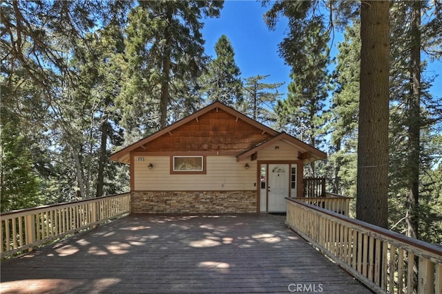 view of front of home with a deck