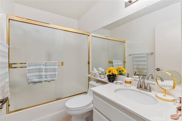 full bathroom with toilet, vanity, and bath / shower combo with glass door