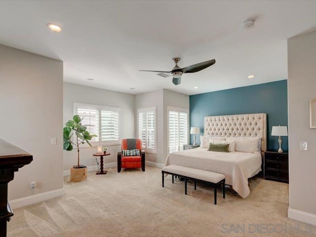 carpeted bedroom featuring ceiling fan