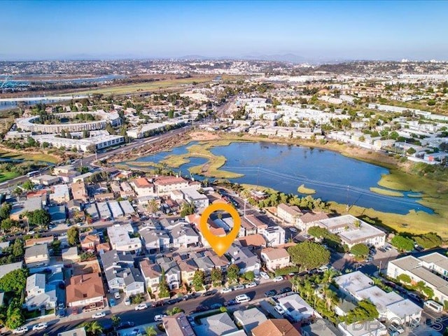 birds eye view of property featuring a water view