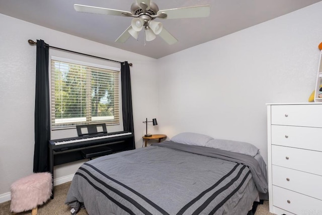 bedroom featuring ceiling fan and carpet flooring