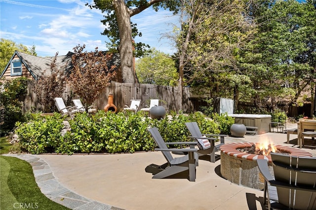 view of patio with an outdoor fire pit