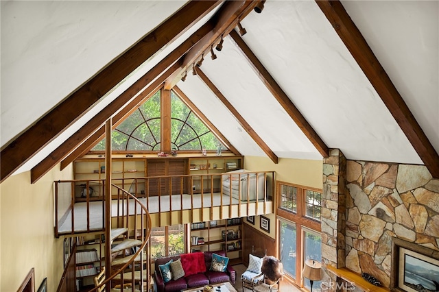 interior space featuring beam ceiling