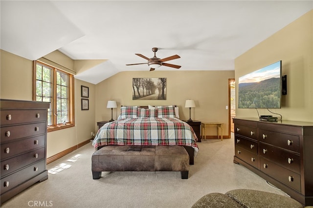 carpeted bedroom featuring lofted ceiling and ceiling fan