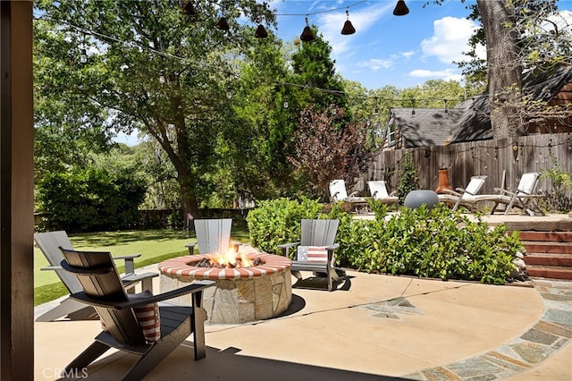 view of patio featuring a fire pit