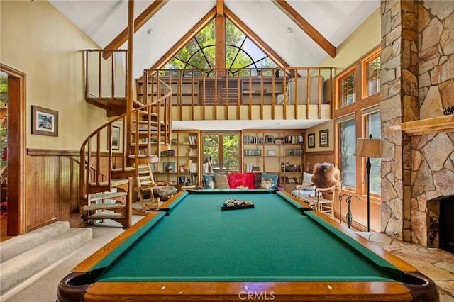 recreation room with a fireplace, beam ceiling, billiards, and high vaulted ceiling