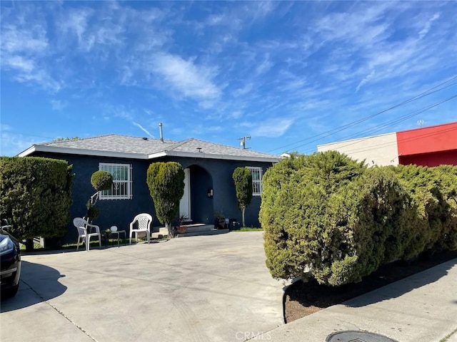 view of front of home featuring stucco siding