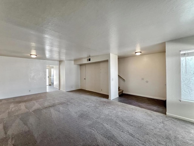 interior space with a textured ceiling