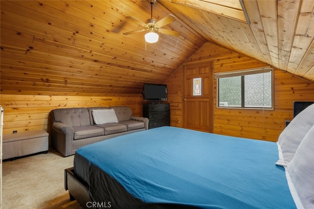 carpeted bedroom featuring lofted ceiling, wooden ceiling, wooden walls, and a ceiling fan