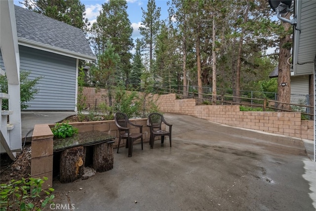 view of patio / terrace with fence