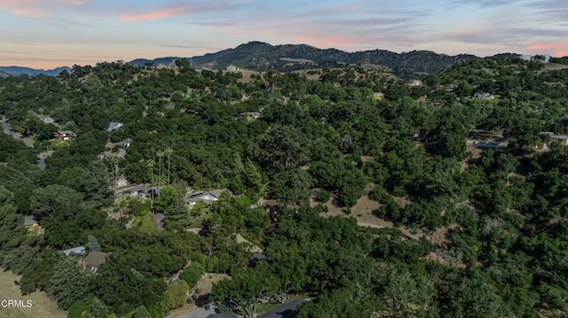 aerial view at dusk with a mountain view