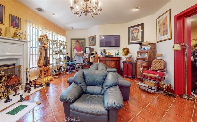 tiled living room featuring a notable chandelier