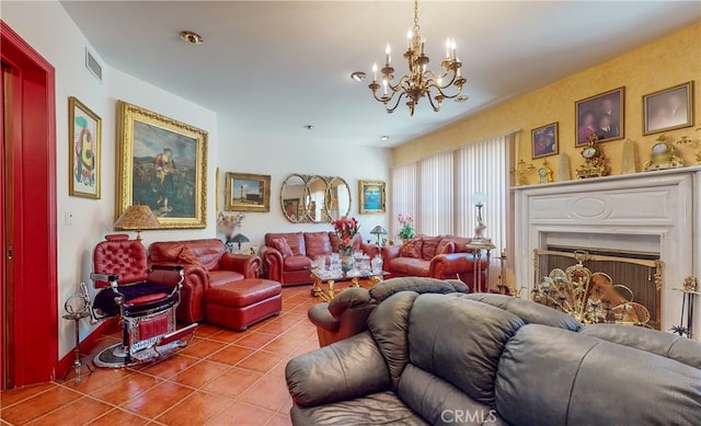 tiled living room with an inviting chandelier