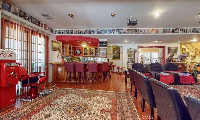 tiled living room with indoor bar