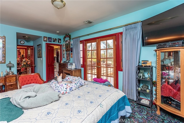 bedroom with french doors and access to outside