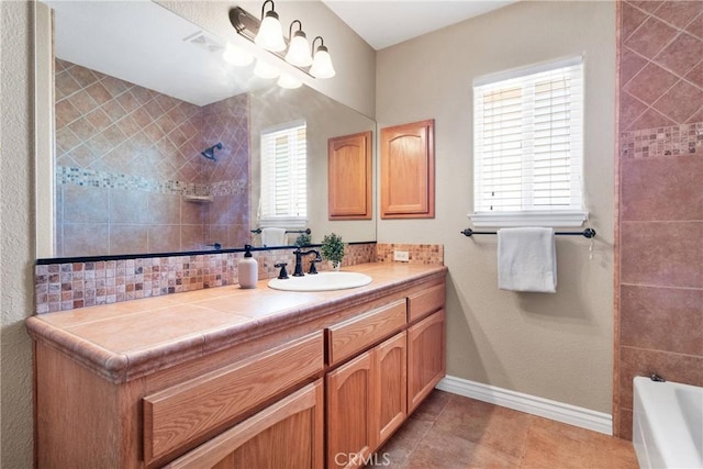 bathroom featuring tile patterned flooring and vanity