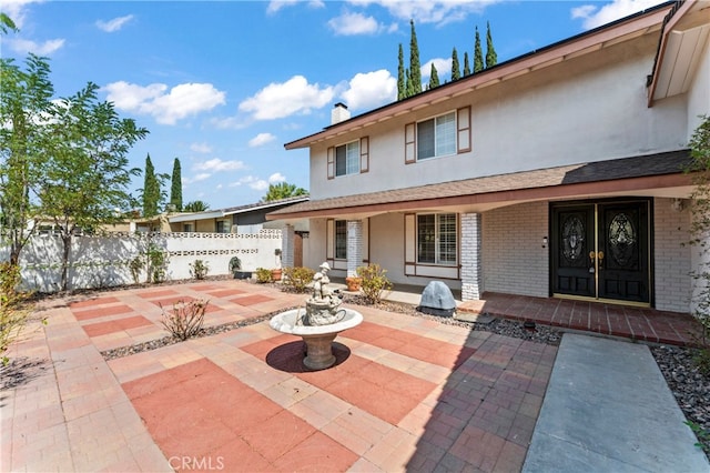 exterior space featuring french doors