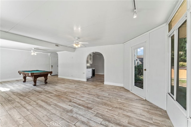 game room with pool table, light wood-type flooring, and ceiling fan