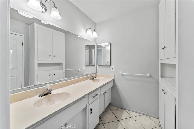 bathroom featuring tile patterned floors and vanity