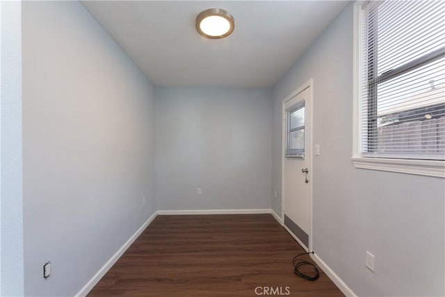 doorway featuring dark hardwood / wood-style floors