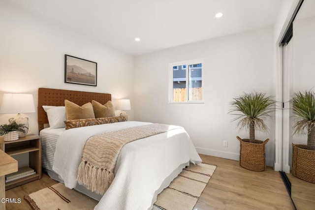 bedroom featuring light hardwood / wood-style floors