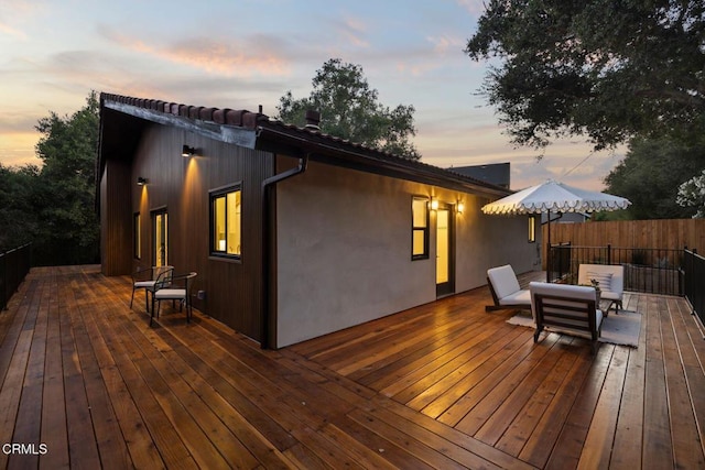 view of deck at dusk