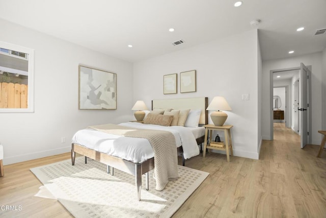 bedroom featuring light wood-type flooring