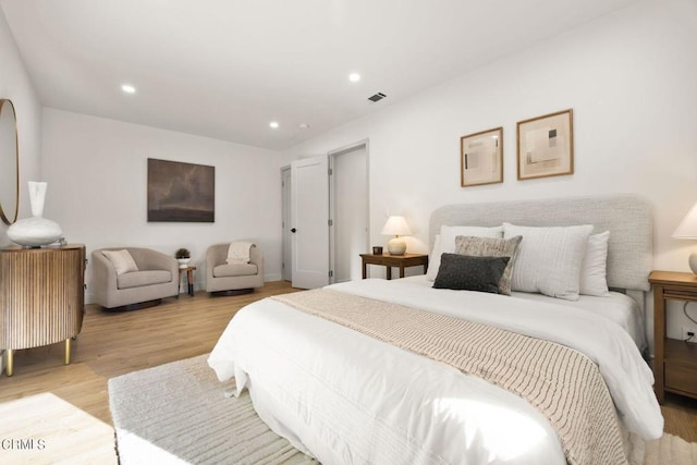 bedroom featuring light hardwood / wood-style floors