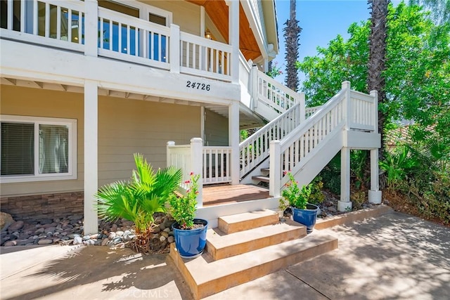 entrance to property with a patio