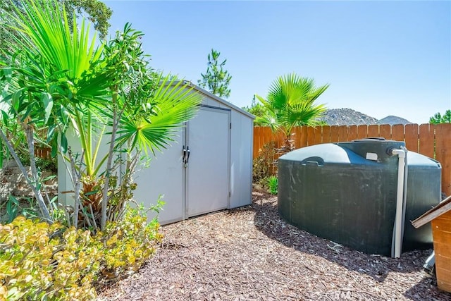 view of outbuilding with a mountain view