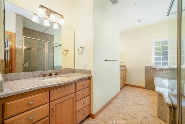 bathroom with tile patterned flooring, plus walk in shower, and vanity