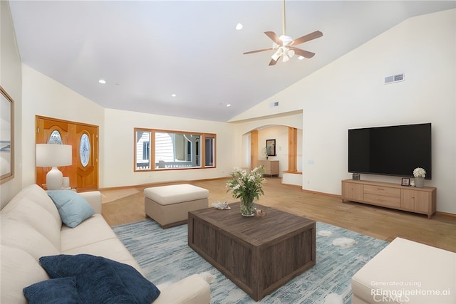 living room featuring high vaulted ceiling, ceiling fan, and light hardwood / wood-style floors