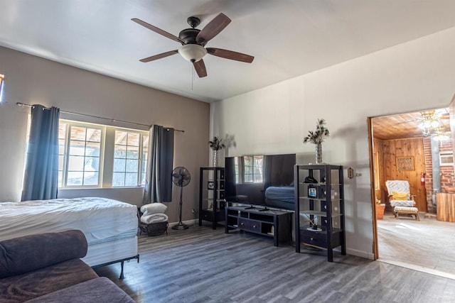 bedroom featuring wood-type flooring and ceiling fan