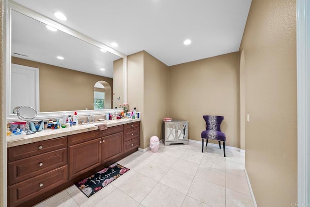 bathroom featuring vanity and tile patterned flooring