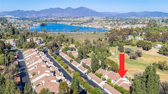 bird's eye view featuring a water and mountain view