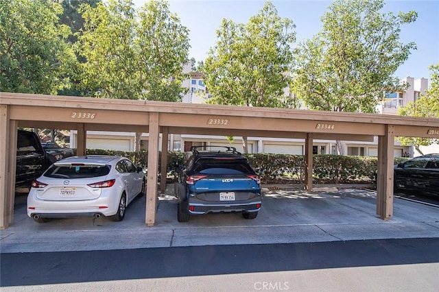 view of car parking featuring a carport