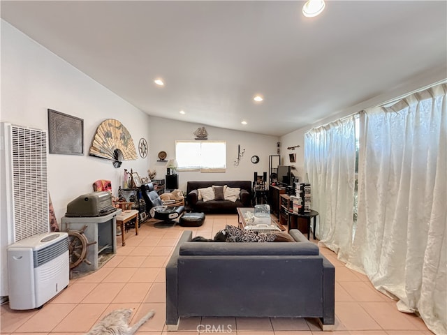 tiled living room with lofted ceiling