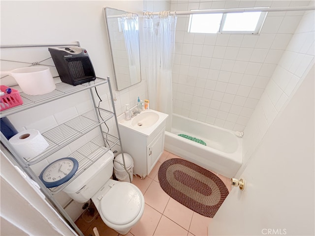 full bathroom featuring shower / tub combo with curtain, tile patterned floors, vanity, and toilet