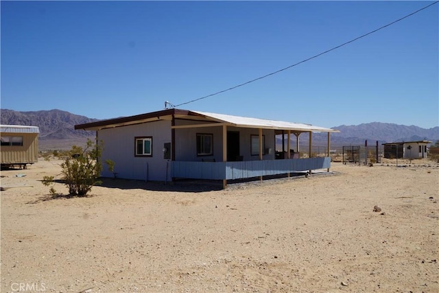 exterior space with a mountain view