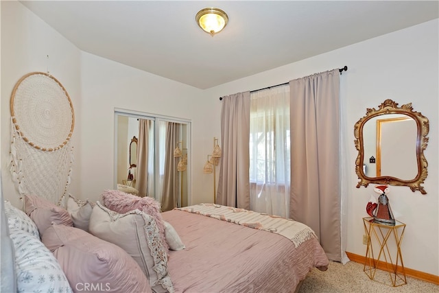 bedroom featuring light carpet