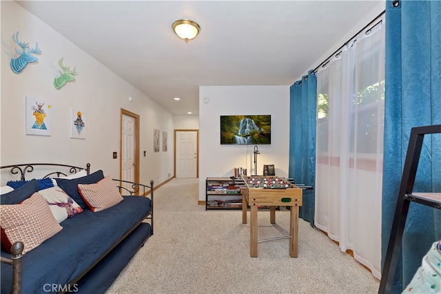 interior space featuring light colored carpet