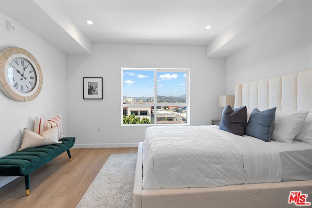 bedroom featuring light wood-type flooring