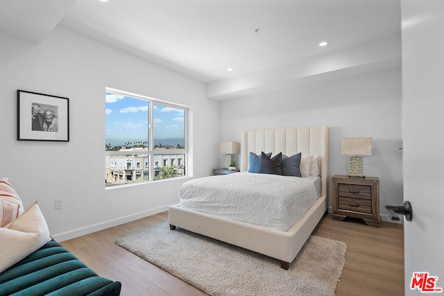 bedroom featuring hardwood / wood-style flooring